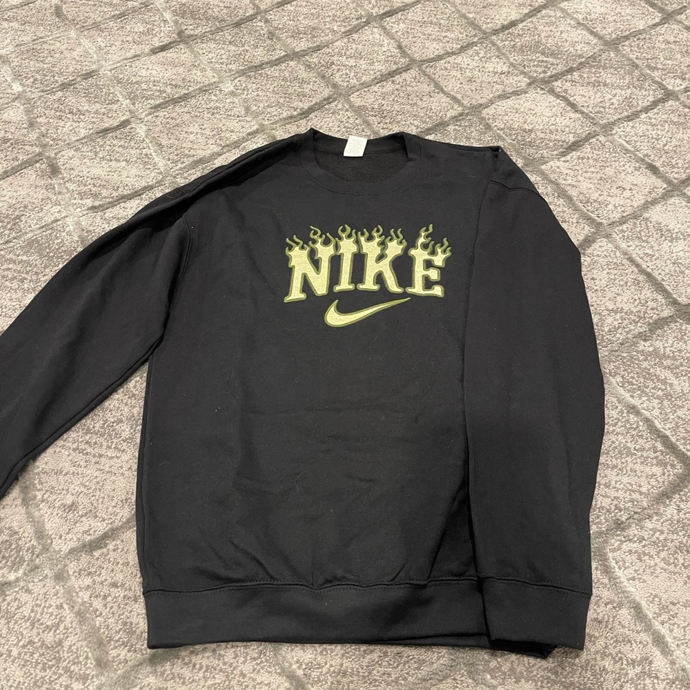 Green Nike flames Etsy hoodie.